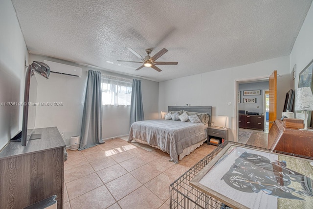 7215 SW 16th St, Miami, FL 33155 - bedroom with light tile patterned floors, a textured ceiling, ceiling fan, and a wall unit AC