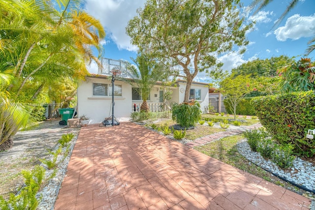 7215 SW 16th St, Miami, FL 33155 - back of house with stucco siding and fence
