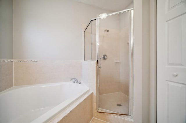 146 NE 36th Ter, Homestead, FL 33033 - full bath featuring a bath and a stall shower