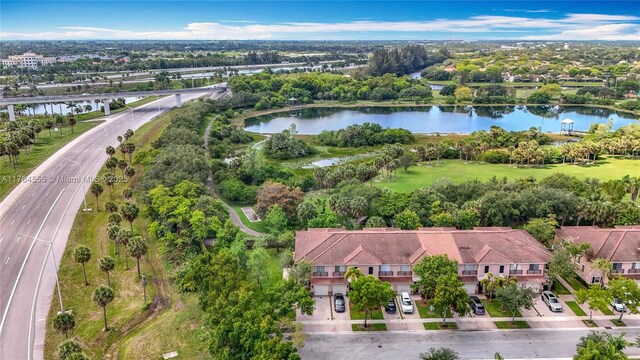 294 Las Brisas Cir, Sunrise, FL 33326 - view of property location featuring a large body of water and a tree filled landscape