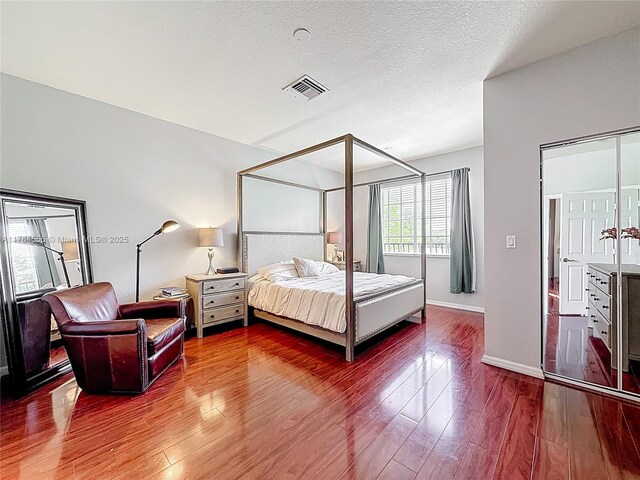 294 Las Brisas Cir, Sunrise, FL 33326 - bedroom featuring wood finished floors and baseboards