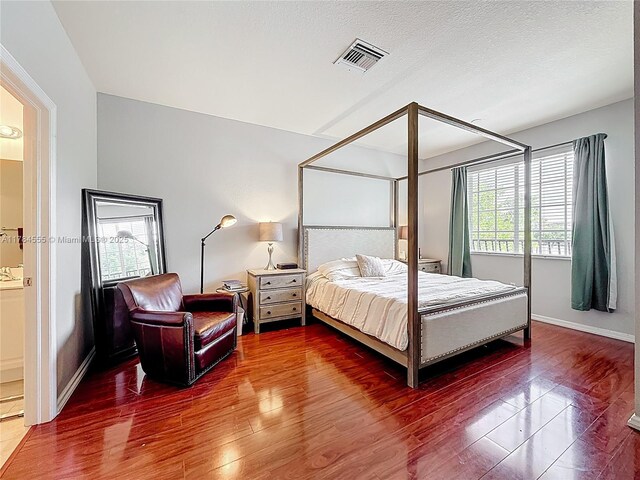 294 Las Brisas Cir, Sunrise, FL 33326 - bedroom featuring multiple windows, wood finished floors, and baseboards