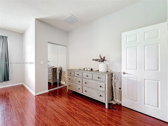 294 Las Brisas Cir, Sunrise, FL 33326 - bedroom featuring dark wood-type flooring, baseboards, and a closet