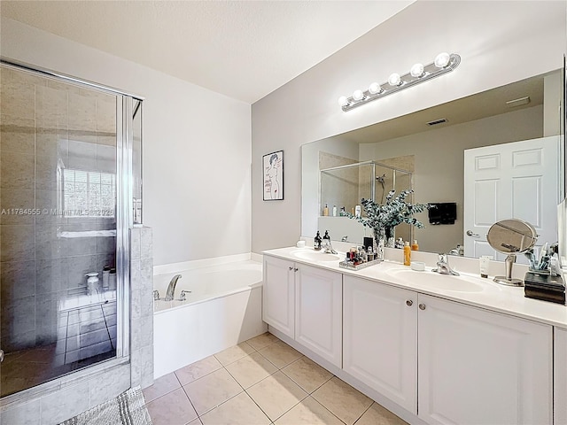 294 Las Brisas Cir, Sunrise, FL 33326 - full bathroom featuring a shower stall, double vanity, a garden tub, and tile patterned floors