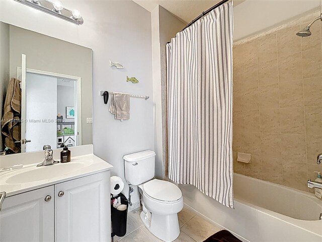 294 Las Brisas Cir, Sunrise, FL 33326 - bathroom featuring tile patterned floors, vanity, toilet, and shower / tub combo with curtain