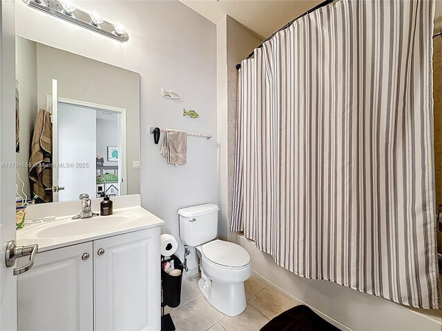 294 Las Brisas Cir, Sunrise, FL 33326 - full bathroom featuring tile patterned floors, toilet, vanity, and shower / bath combination with curtain