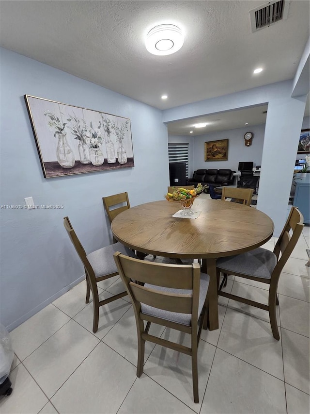 12585 NE Miami Ct, North Miami, FL 33161 - dining space with recessed lighting, a textured ceiling, and visible vents