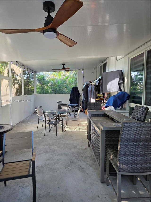12585 NE Miami Ct, North Miami, FL 33161 - view of patio / terrace featuring ceiling fan, outdoor dining space, and outdoor dry bar