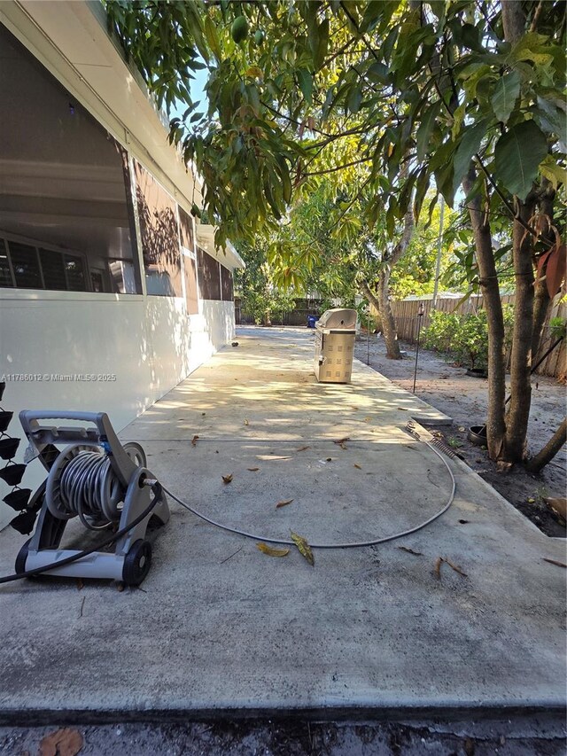 12585 NE Miami Ct, North Miami, FL 33161 - view of patio with a fenced backyard