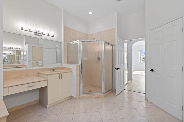 full bath with vanity, tile patterned floors, a stall shower, and recessed lighting