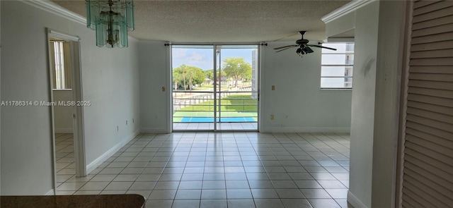 14195 SW 87th St Unit B306, Miami, FL 33183 - empty room with healthy amount of natural light, a textured ceiling, ceiling fan, crown molding, and light tile patterned floors