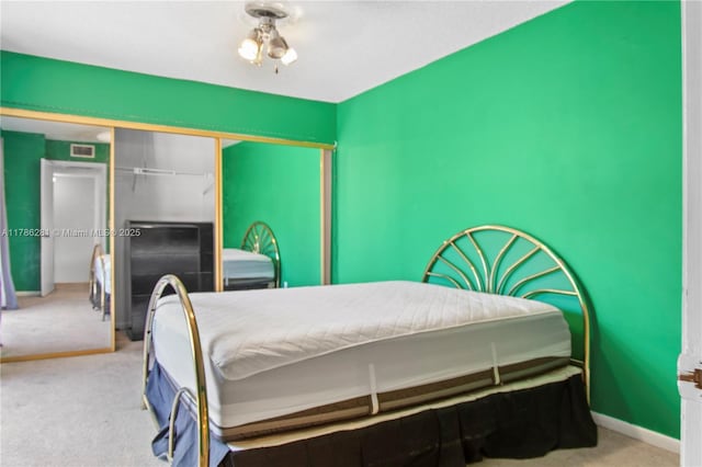 2572 Lakeview Ct, Cooper City, FL 33026 - bedroom with carpet floors, baseboards, visible vents, and a closet