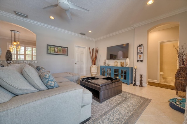 1454 Newhaven Point Ln, West Palm Beach, FL 33411 - living area with arched walkways, ceiling fan, crown molding, recessed lighting, and light tile patterned floors