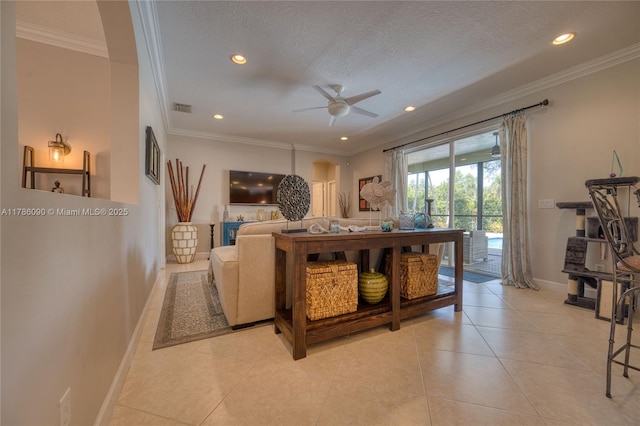 1454 Newhaven Point Ln, West Palm Beach, FL 33411 - living area with a ceiling fan, recessed lighting, crown molding, light tile patterned flooring, and a textured ceiling