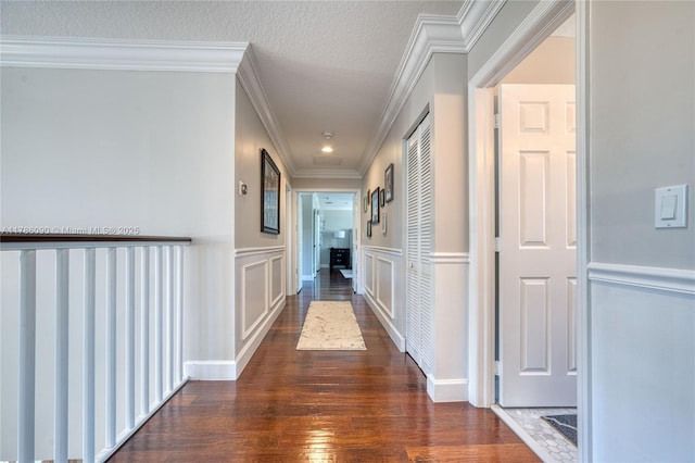 1454 Newhaven Point Ln, West Palm Beach, FL 33411 - corridor featuring wood finished floors, wainscoting, a decorative wall, and ornamental molding