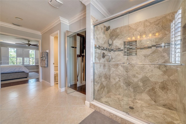 1454 Newhaven Point Ln, West Palm Beach, FL 33411 - ensuite bathroom featuring a stall shower, ornamental molding, ceiling fan, and tile patterned floors