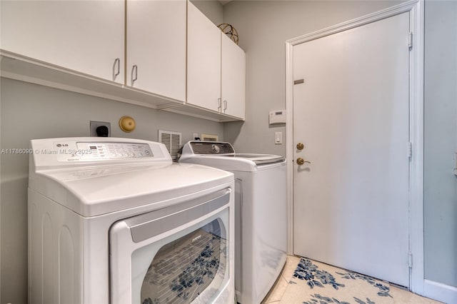 1454 Newhaven Point Ln, West Palm Beach, FL 33411 - laundry room with cabinet space and washing machine and dryer