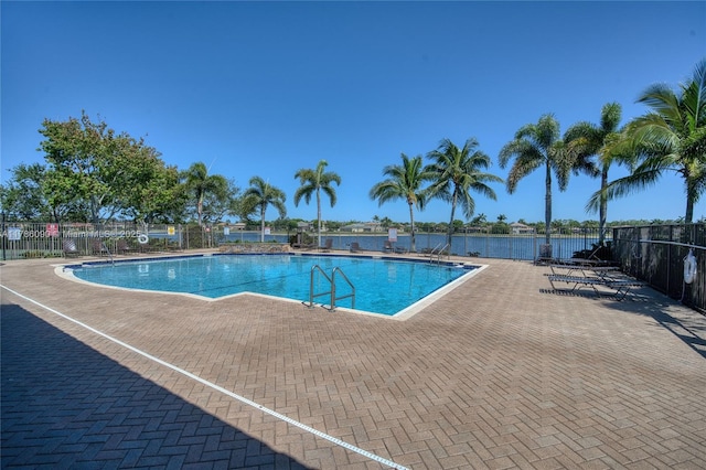 1454 Newhaven Point Ln, West Palm Beach, FL 33411 - community pool with a patio area