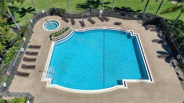 1454 Newhaven Point Ln, West Palm Beach, FL 33411 - community pool with a patio and a community hot tub