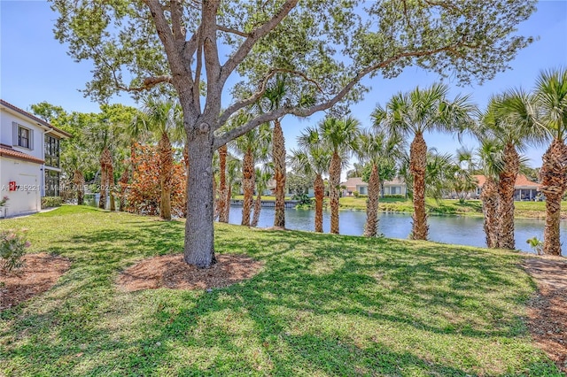 6121 SE Landing Way Unit 13, Stuart, FL 34997 - view of grassy yard with a water view