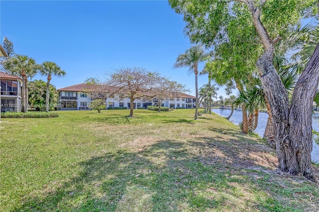 6121 SE Landing Way Unit 13, Stuart, FL 34997 - view of green lawn featuring a water view