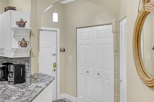 6121 SE Landing Way Unit 13, Stuart, FL 34997 - entrance foyer featuring arched walkways and baseboards