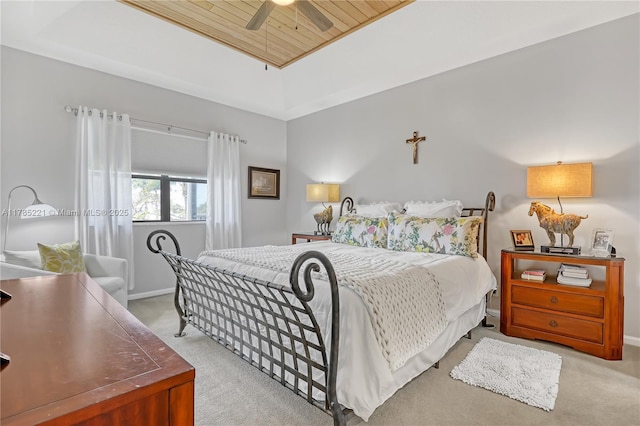 6121 SE Landing Way Unit 13, Stuart, FL 34997 - carpeted bedroom featuring wooden ceiling, a ceiling fan, and baseboards