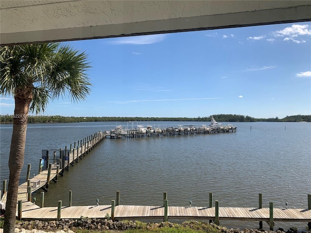 6121 SE Landing Way Unit 13, Stuart, FL 34997 - dock featuring a water view