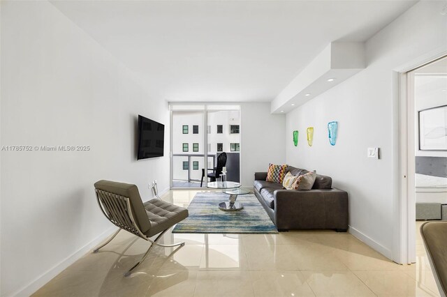 6365 Collins Ave Unit 805, Miami Beach, FL 33141 - living area featuring baseboards, recessed lighting, and light tile patterned floors
