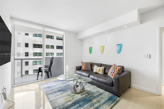 6365 Collins Ave Unit 805, Miami Beach, FL 33141 - living room with recessed lighting, tile patterned flooring, and baseboards