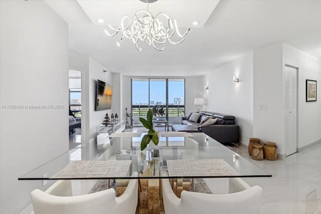 3400 192nd St Unit 1606, Aventura, FL 33180 - dining room with a wall of windows, a chandelier, and recessed lighting