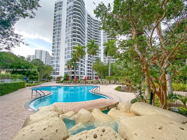 3400 192nd St Unit 1606, Aventura, FL 33180 - community pool featuring a patio area