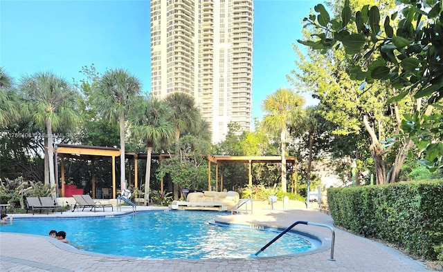 3400 192nd St Unit 1606, Aventura, FL 33180 - community pool featuring a patio