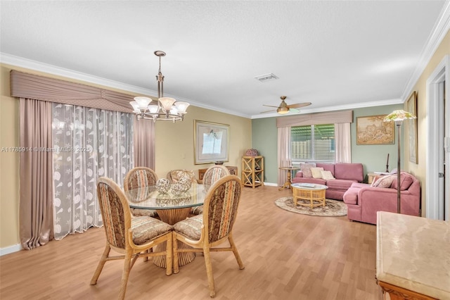14898 Wildflower Ln Unit 0, Delray Beach, FL 33446 - dining area with light wood-type flooring, crown molding, a chandelier, a ceiling fan, and baseboards