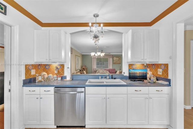 14898 Wildflower Ln Unit 0, Delray Beach, FL 33446 - kitchen with dishwasher, a sink, a chandelier, backsplash, and crown molding