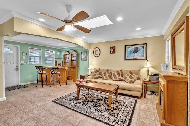 14898 Wildflower Ln Unit 0, Delray Beach, FL 33446 - living area with arched walkways, crown molding, recessed lighting, a ceiling fan, and baseboards