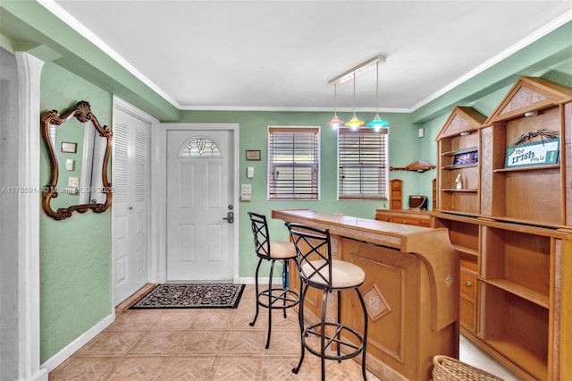 14898 Wildflower Ln Unit 0, Delray Beach, FL 33446 - foyer featuring baseboards and crown molding
