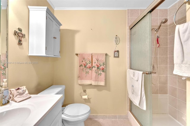 14898 Wildflower Ln Unit 0, Delray Beach, FL 33446 - full bathroom featuring a shower stall, vanity, toilet, ornamental molding, and baseboards