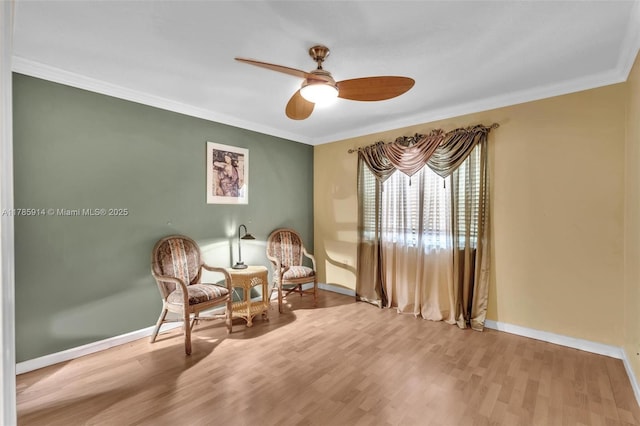14898 Wildflower Ln Unit 0, Delray Beach, FL 33446 - living area with crown molding, a ceiling fan, baseboards, and wood finished floors