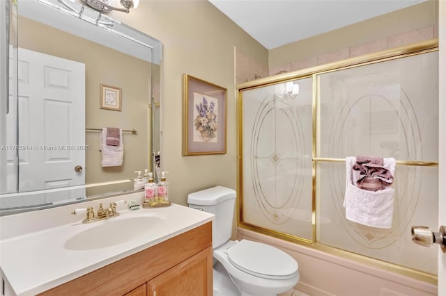 14898 Wildflower Ln Unit 0, Delray Beach, FL 33446 - bathroom with bath / shower combo with glass door, toilet, and vanity
