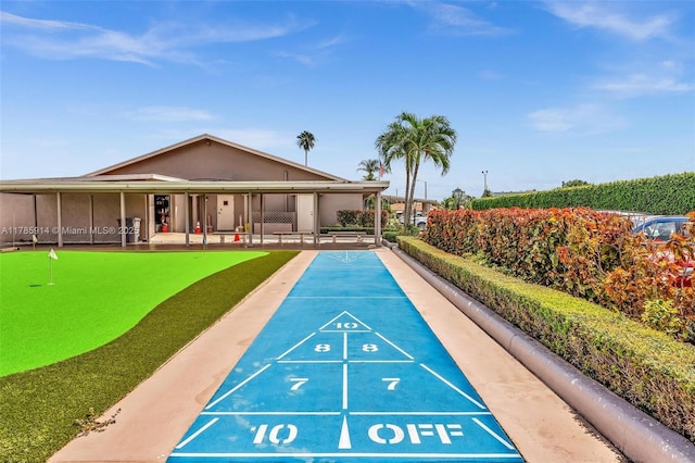 14898 Wildflower Ln Unit 0, Delray Beach, FL 33446 - view of home's community with a putting green and shuffleboard