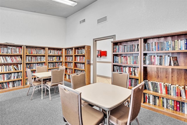 14898 Wildflower Ln Unit 0, Delray Beach, FL 33446 - carpeted home office with wall of books