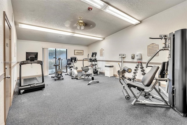 14898 Wildflower Ln Unit 0, Delray Beach, FL 33446 - workout area with a textured ceiling