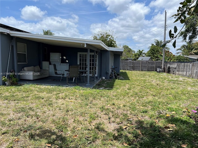 view of yard featuring a fenced backyard and a patio