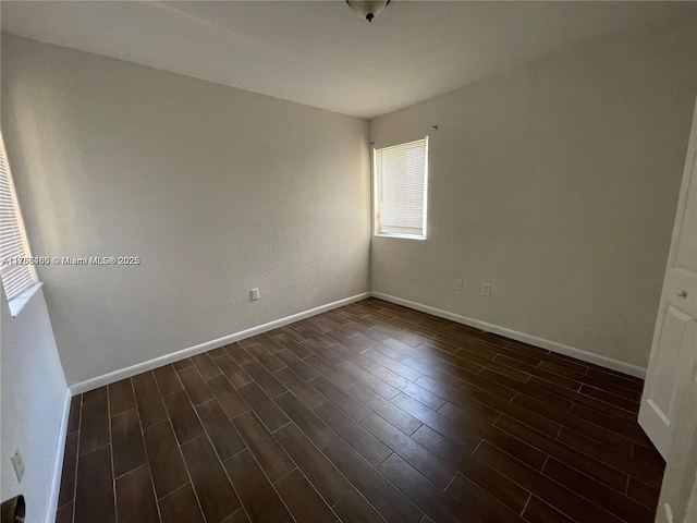 948 SW 6th Ct, Florida City, FL 33034 - empty room with baseboards and dark wood-type flooring