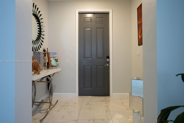 102 NE 23rd Ter, Homestead, FL 33033 - entrance foyer featuring baseboards and marble finish floor