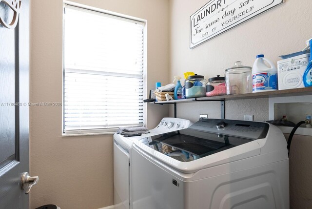 102 NE 23rd Ter, Homestead, FL 33033 - clothes washing area with independent washer and dryer and laundry area