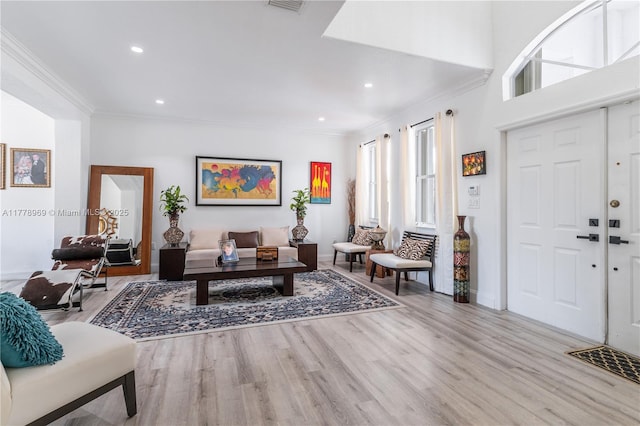 1733 SW 151st Pl, Miami, FL 33185 - living area featuring wood finished floors, ornamental molding, and recessed lighting