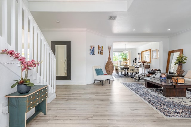 1733 SW 151st Pl, Miami, FL 33185 - foyer entrance with light wood-style floors, crown molding, a chandelier, and recessed lighting