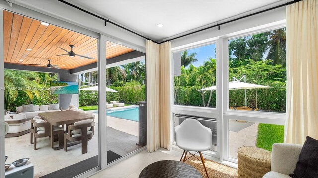 10603 NE 11th Ave, Miami Shores, FL 33138 - sunroom / solarium featuring healthy amount of natural light and tile patterned floors
